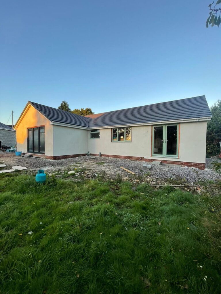 Traditional sand and cement render on a detached bungalow in Coalpit Heath